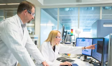 Scientists Viewing Monitors