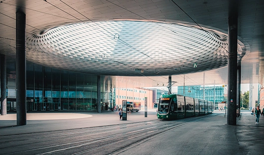 A Basel tram arrives at the Messeplatz station