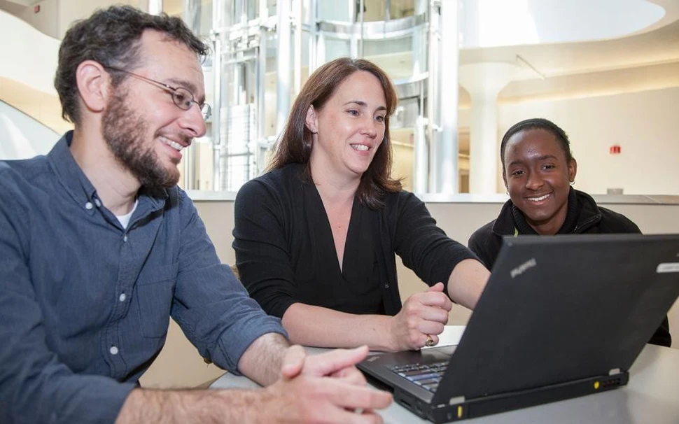 Elizabeth Wiellette (middle), a lead investigator at Novartis, helped Benjamin develop her critical thinking skills, spending hours on RT-PCR data alone