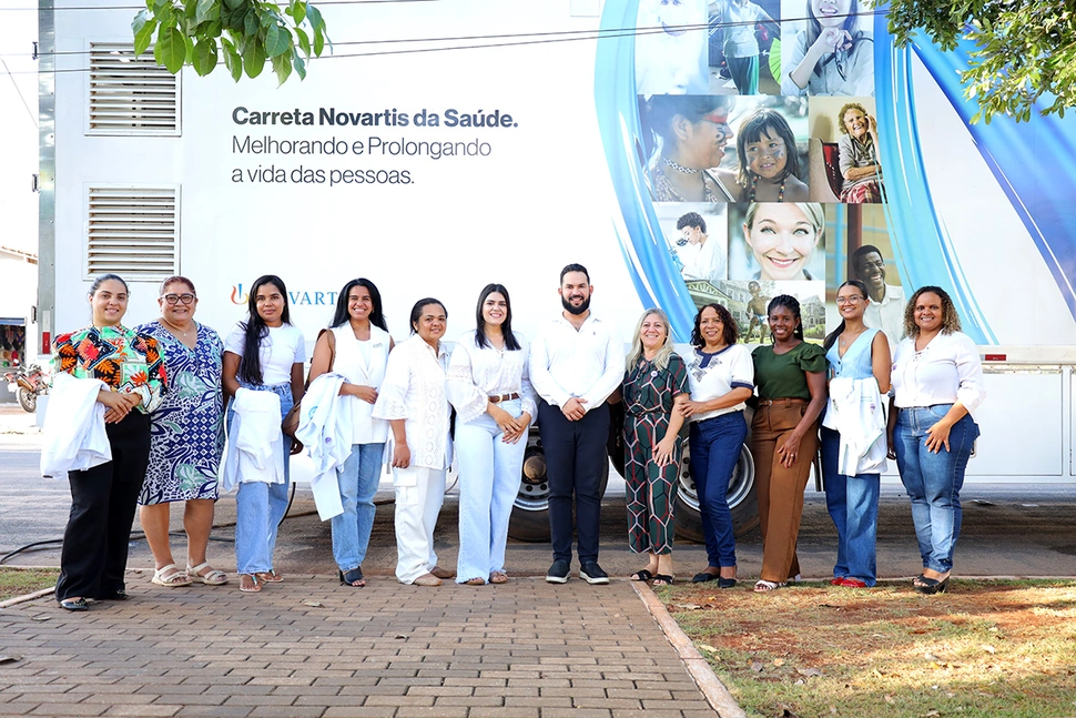 The Novartis Health Truck team in front of the vehicle