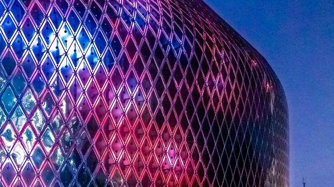 Illumination of zero-energy media facade of the Novartis Pavillon.