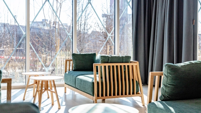 Interior view on the ground floor of the Novartis Pavillon. Lobby set-up in the event space on the ground floor of the Novartis Pavillon.