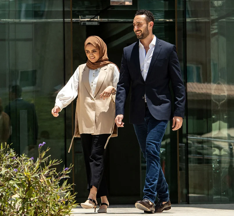 couple leaving office