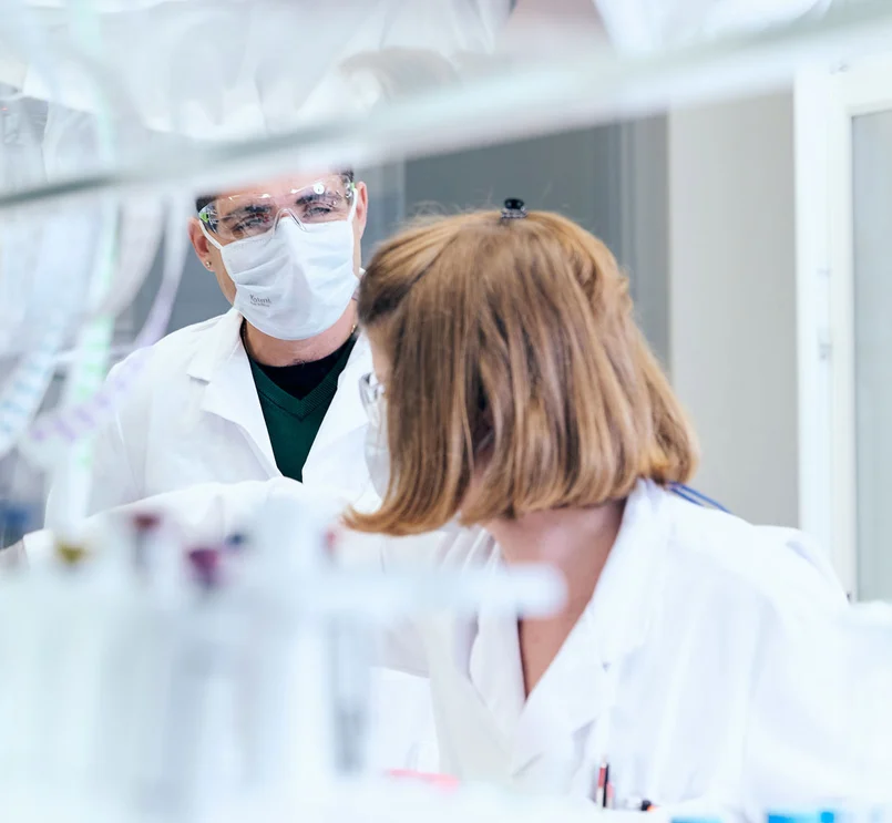 scientists working together in lab