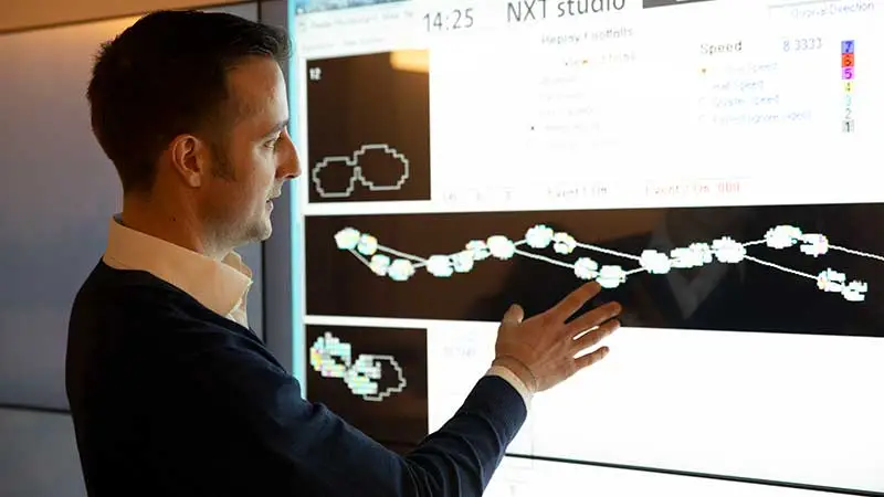 man at digital display