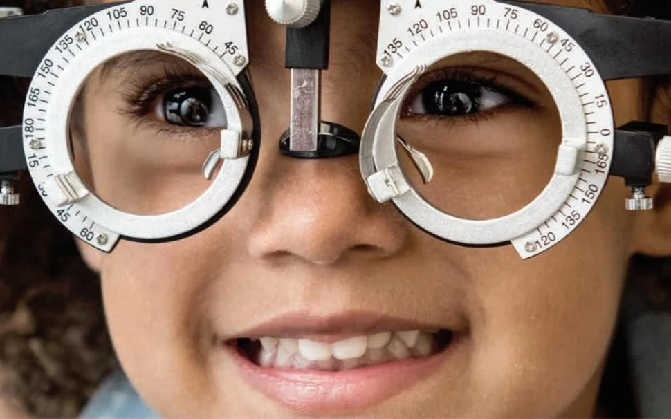 Young girl at eye doctor
