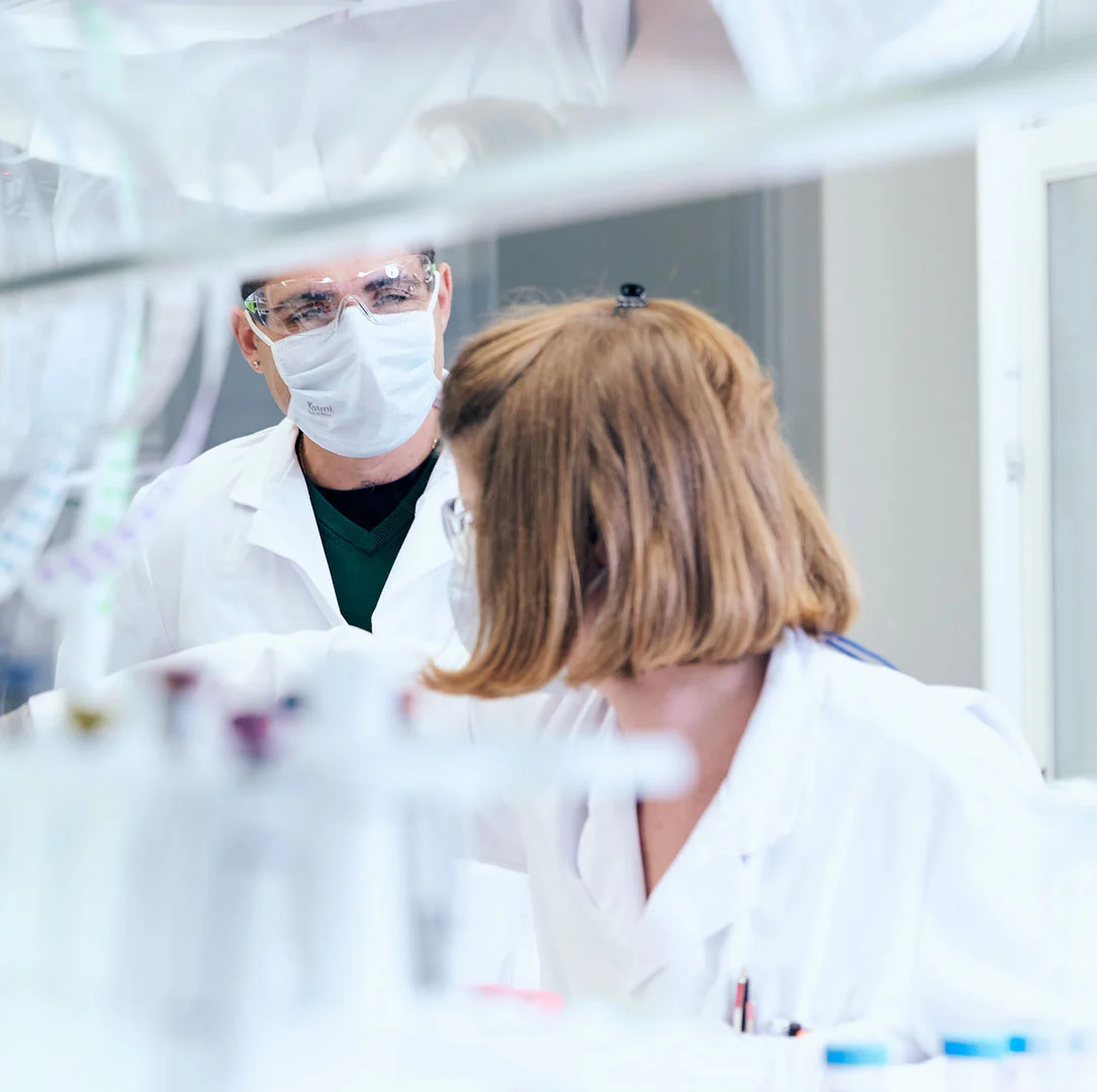 scientists working together in lab