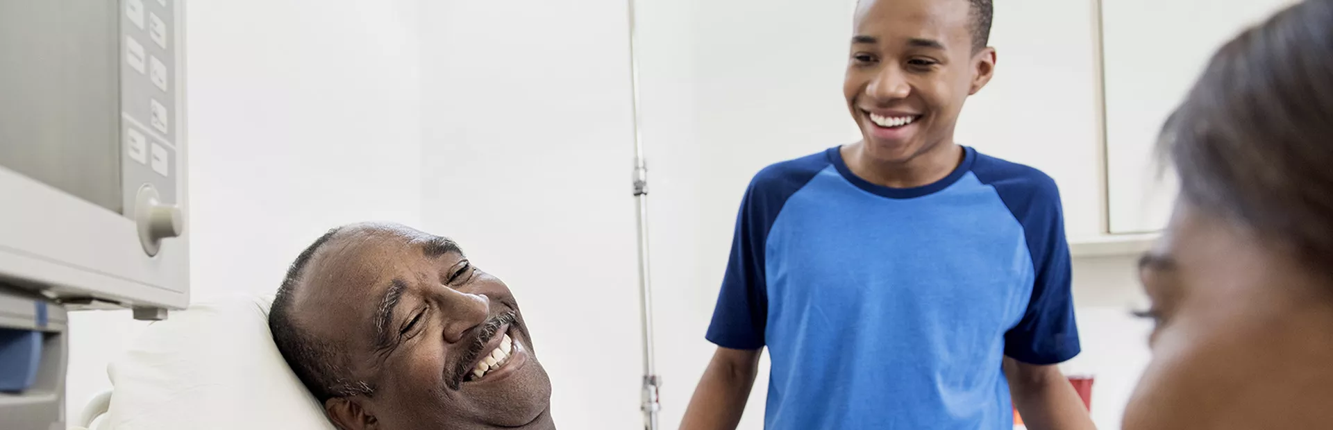 Black Patient and Son at Health Check