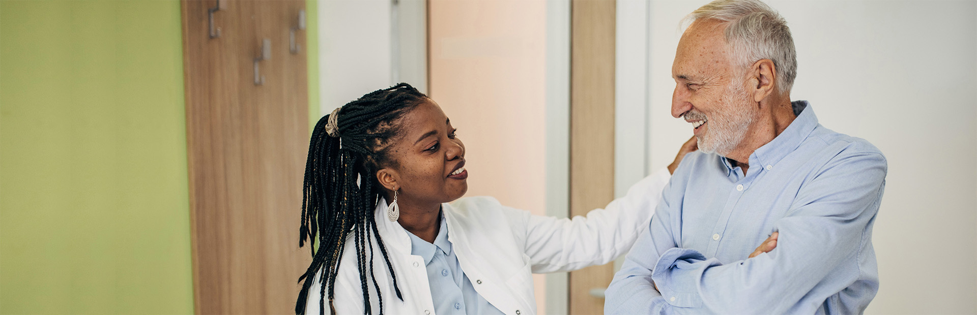 Female doctor and elderly patient