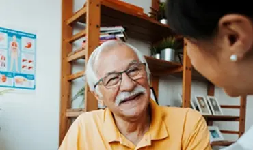 senior patient with healthcare professional