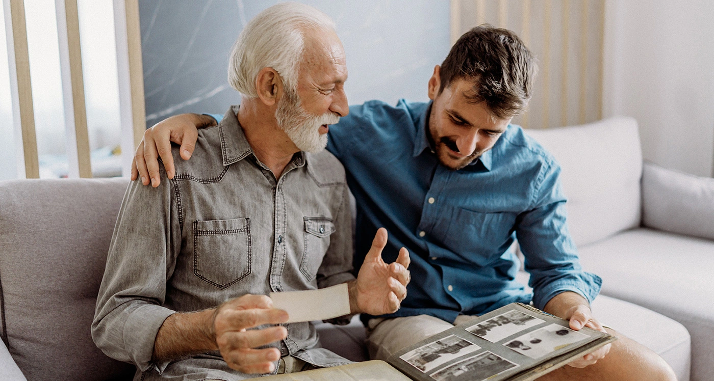 Two men sitting on a couch