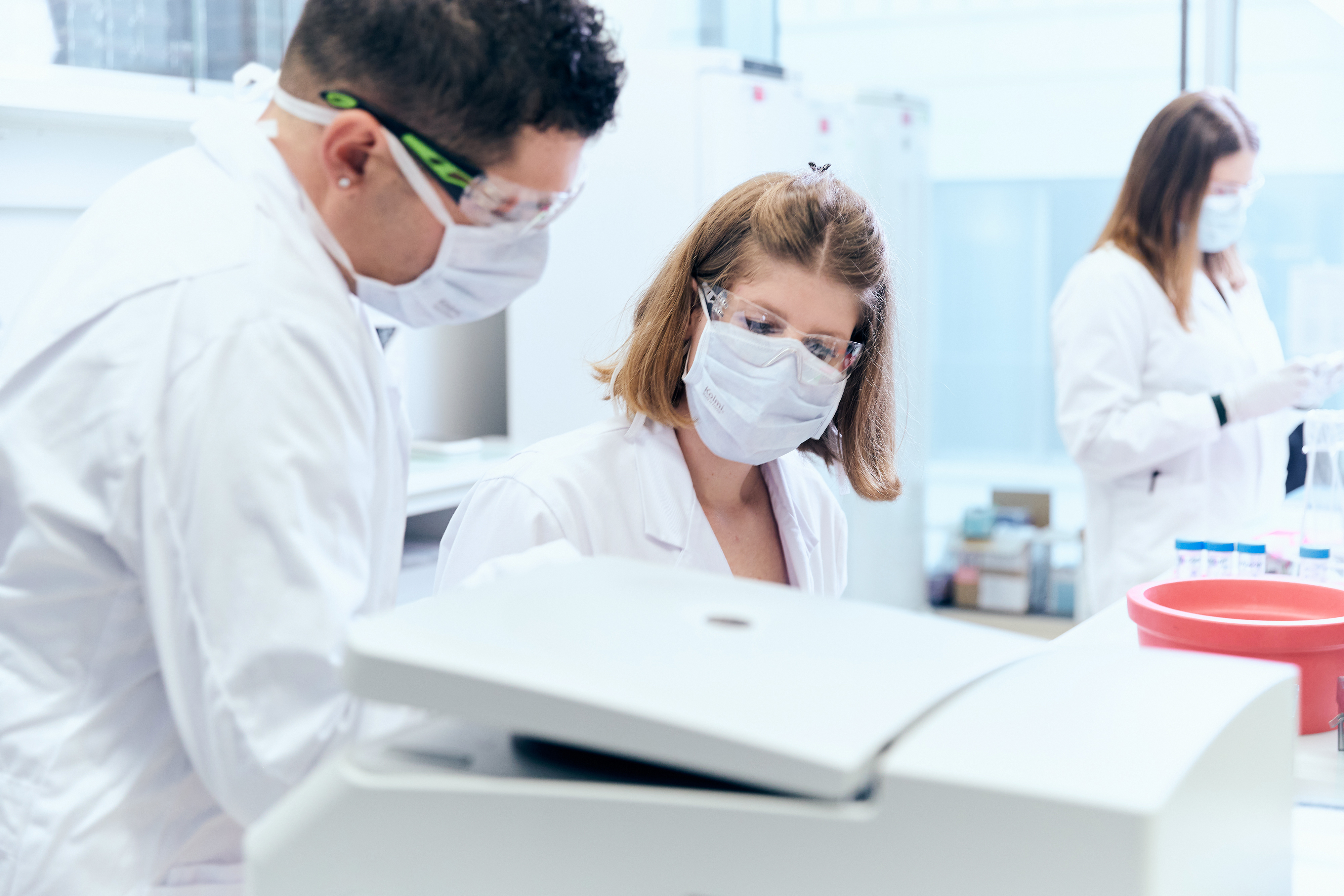 A group of researchers in a lab.