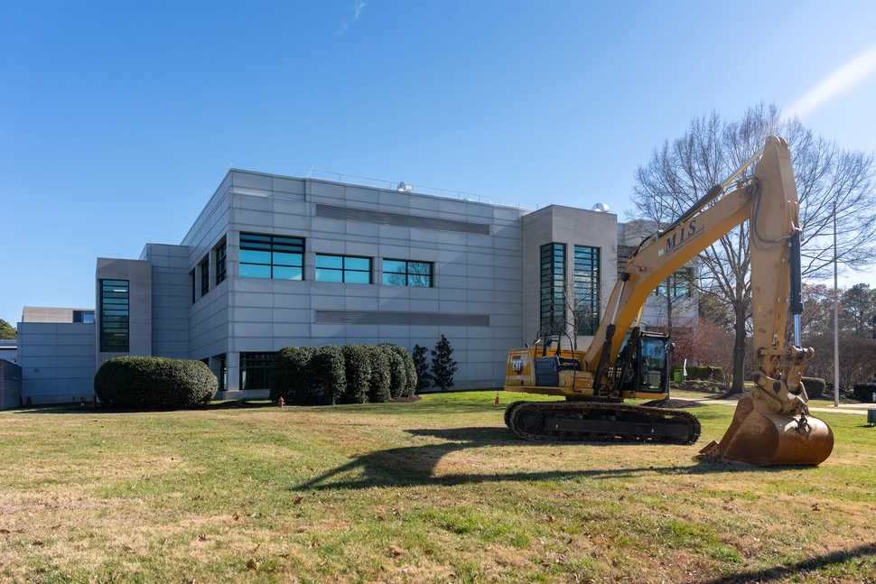 A bulldozer on the groundbreaking site.