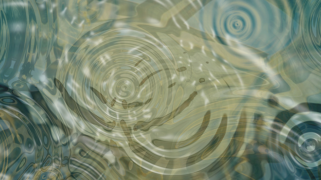 Circular ripples across water