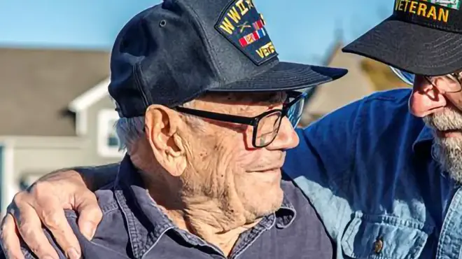 Two US military veterans embrace