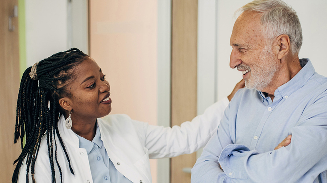 Female doctor and elderly patient